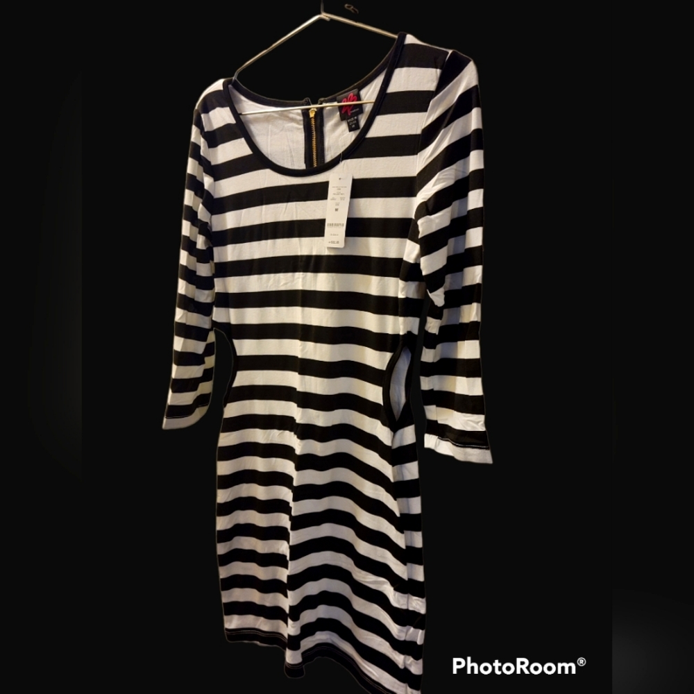 Black/White Striped BeBe Dress, with cutout sides, size M